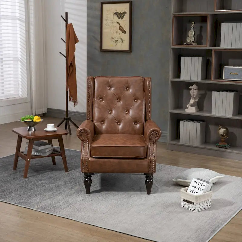 Fauteuil d'appoint capitonné à dossier haut avec garniture cloutée et pieds en bois massif